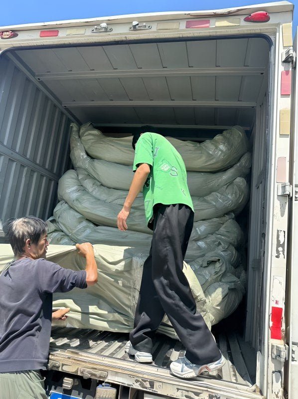 Warehouse inventory of Suzuki body parts ready for dispatch